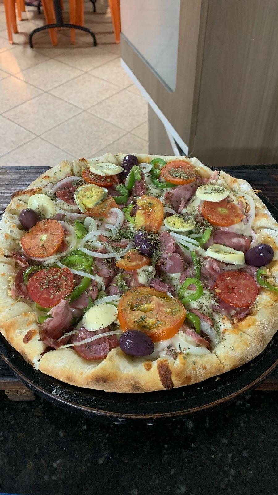 Pizza 4 fatias à moda do Dú 